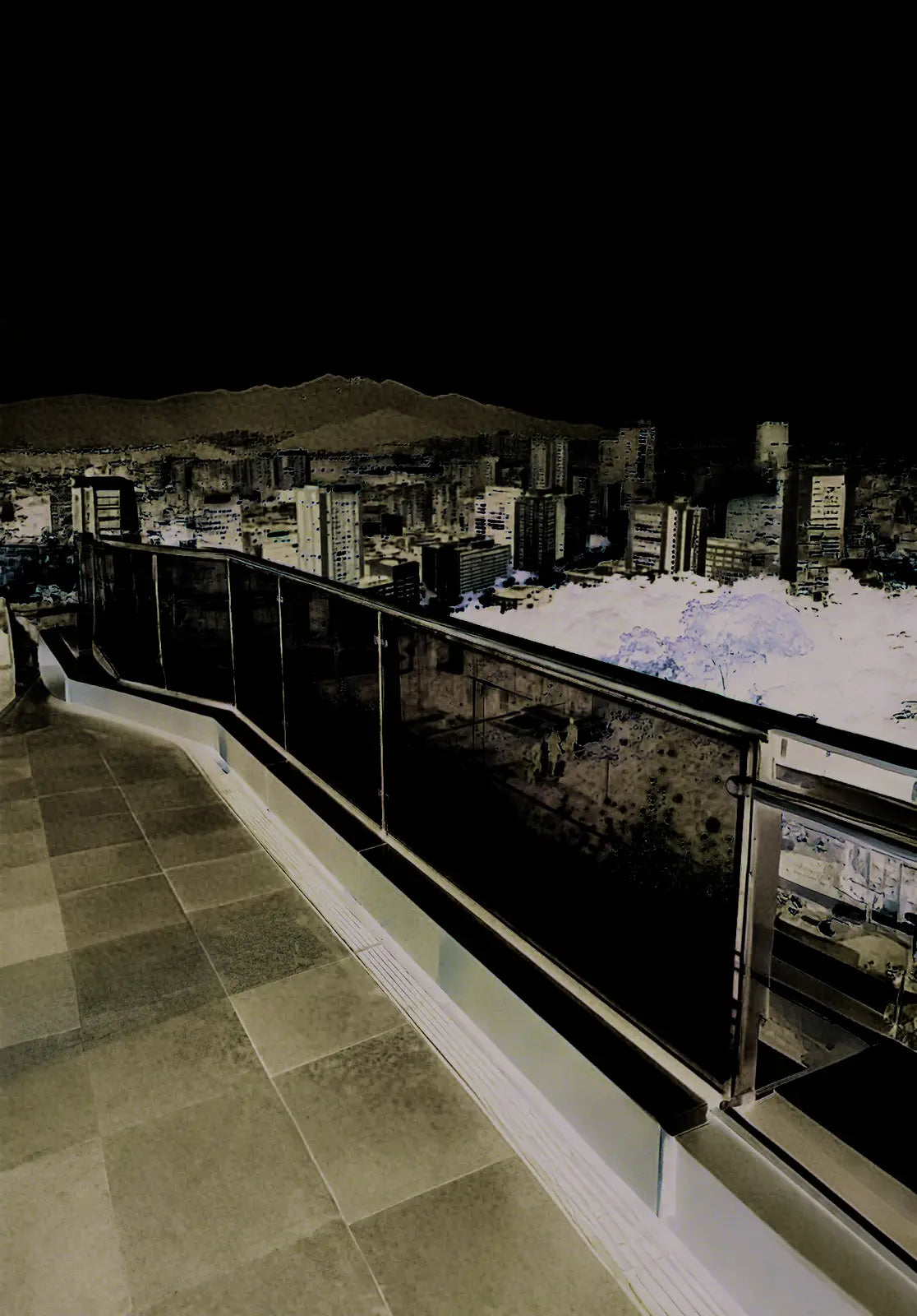 Transparent guardrail display illuminated at night